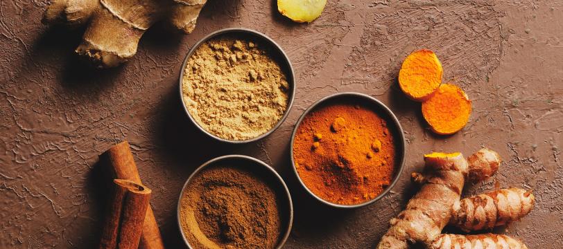 Bowls of different spices on a table