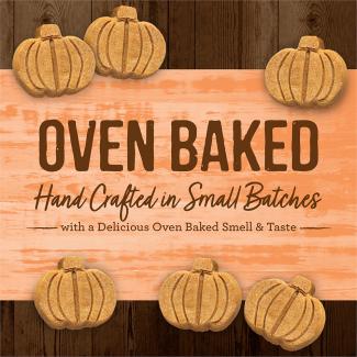 Oven Baked Pumpkin Patch pumpkin-shaped dog treats with an orange background that says “Oven baked hand crafted in small batches with a delicious oven baked smell & taste.” 