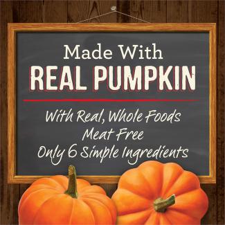 Pumpkins and a chalk board with the words “Made with real pumpkin. With real, whole foods. Meat free. Only 6 simple ingredients.” 