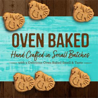 Oven Baked Turducken turkey-shaped dog treats with a blue background that says “Oven baked hand crafted in small batches with a delicious oven baked smell & taste.” 